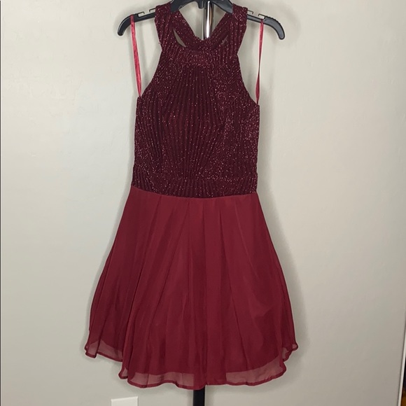 Trixxi Dresses & Skirts - Francesca’s Lilith Back Bow Flare dress